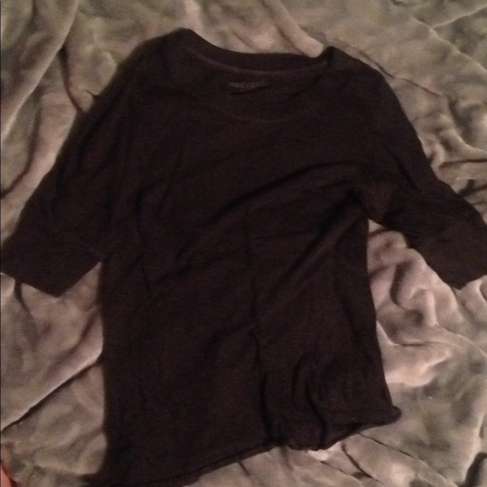 Grey/black quarter sleeve high waisted shirt.